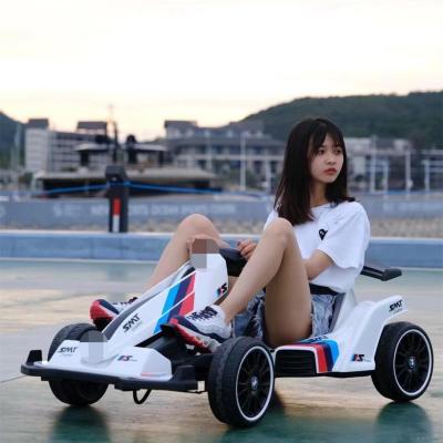 SMT  Coche de deriva niños coche eléctrico karting hombres y Mujeres tesoro cargable con coche de juguete de control remoto puede sentarse en adultos