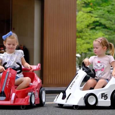 Coche de juguete para niños coche eléctrico karting hombres y Mujeres coche rotativo cargable coche de deriva de bebé humano 1-4 control remoto